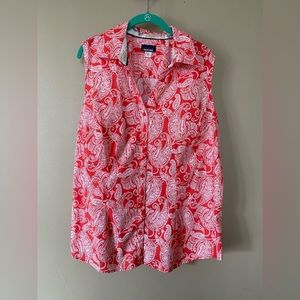 Paisley, orange slightly fitted, sleeveless blouse.